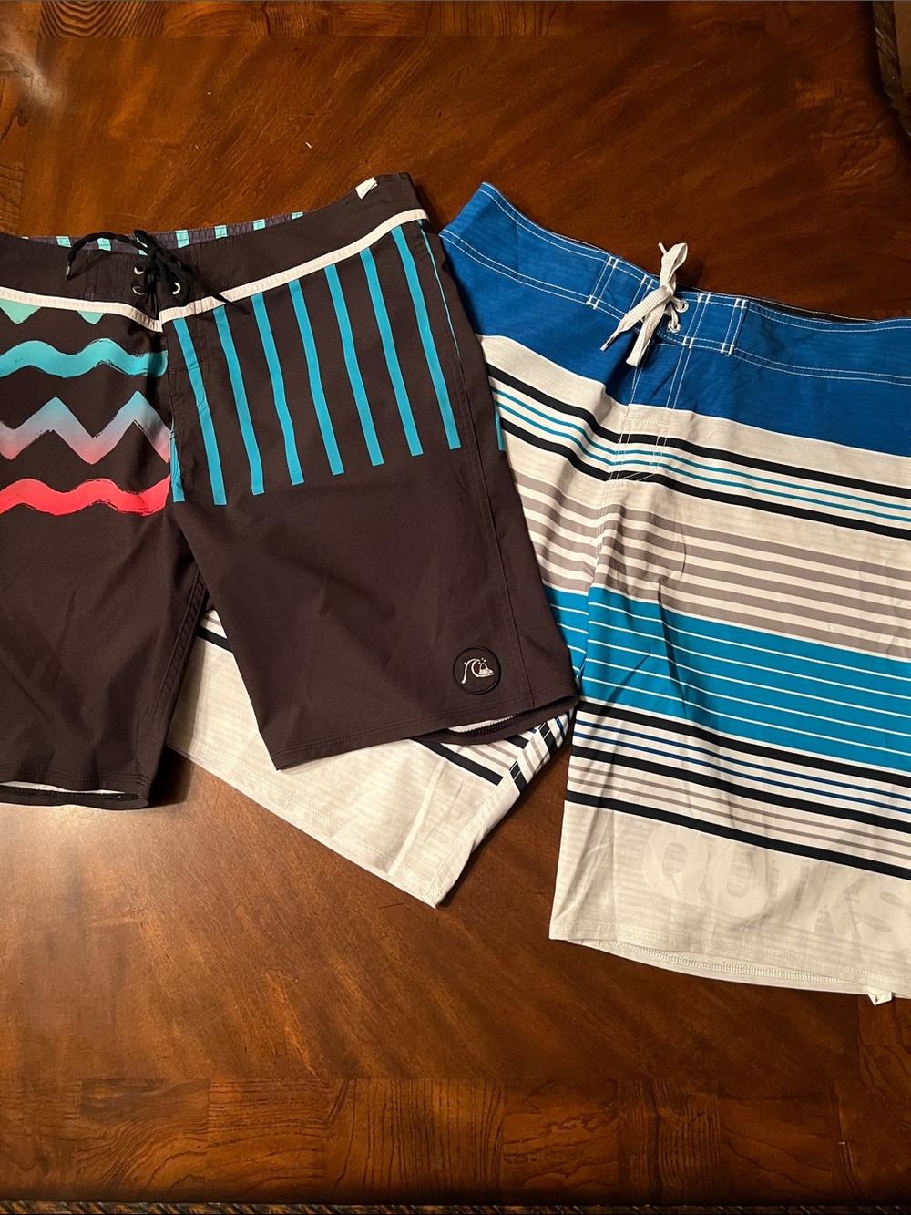 Bundle of 2 Quiksilver Men’s Black Swim Board Shorts with Teal & Coral Accents